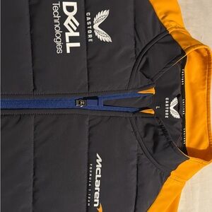 Castore Men's Black and Orange Vest